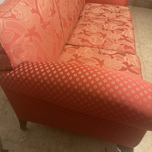 Vintage 1960s sofa with floral upholstery and carved wooden legs