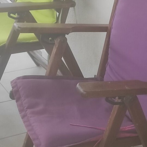 Balcony table with 4 wooden folding chairs used