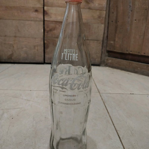 Coca-Cola bottle French like new with original cap