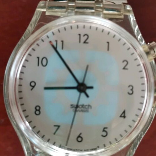 Swatch watch with illuminated dial like new