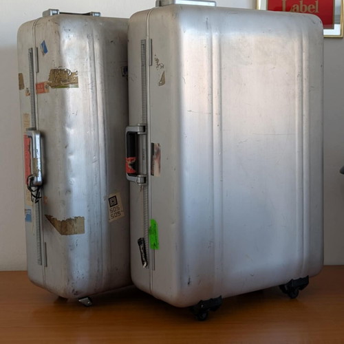 Zero Halliburton metal travel suitcases used, silver, pair