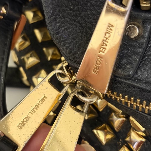 Michael Kors leather backpack used with broken zipper black