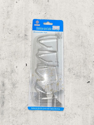 Set of 4 stainless steel tablecloth clips, new