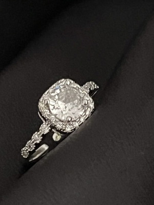 Ring like new silver tone with central white stone and zirconia