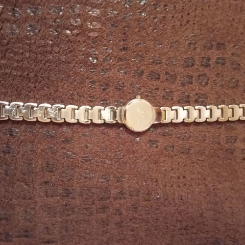 Women's elegant silver watch like new with bracelet and white stones