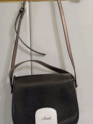 Handbag like new, black with bronze and white details