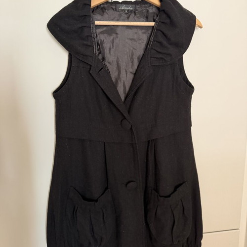 Black Sleeveless Coat size M used with minor wear