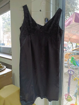 DAK dress size 46 used, black with minor repair needed