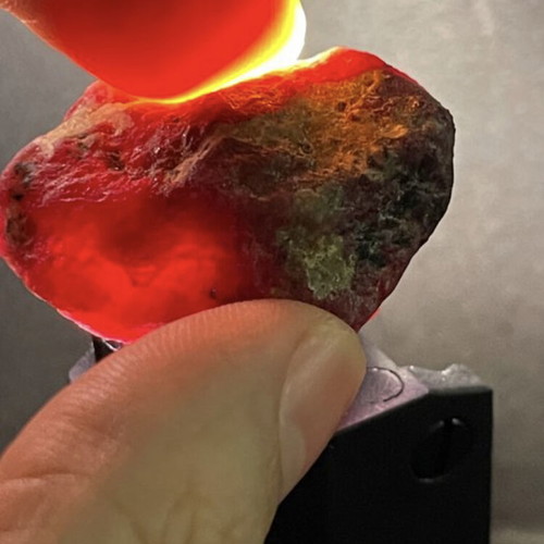 Raw large ruby 109ct in airtight display case