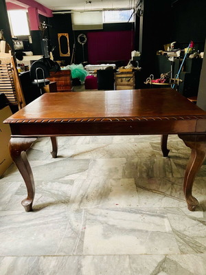 Wooden antique carved dining table with lion legs used