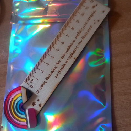 Wooden ruler with engraved phrase, new