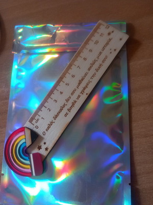 Wooden ruler with engraved phrase, new