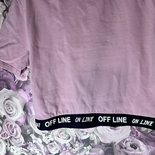 Pink short-sleeve crop top with black elastic band, size M