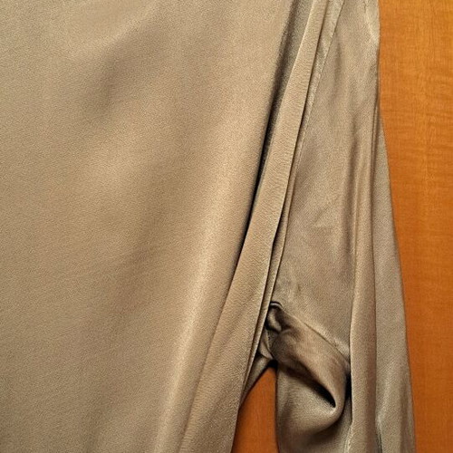 Satin dress new, beige, long sleeve with one shoulder exposed