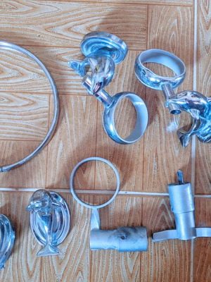 Bathroom accessory set used, chrome with dolphin design and shower handset
