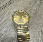 Swatch Dazzling Light χρυσαφί μπρασελέ από ανοξείδωτο ατσάλι μεταχειρισμένο σε καλή κατάσταση