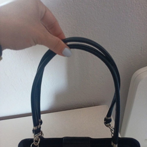 Women's black handbag with silver details, like new