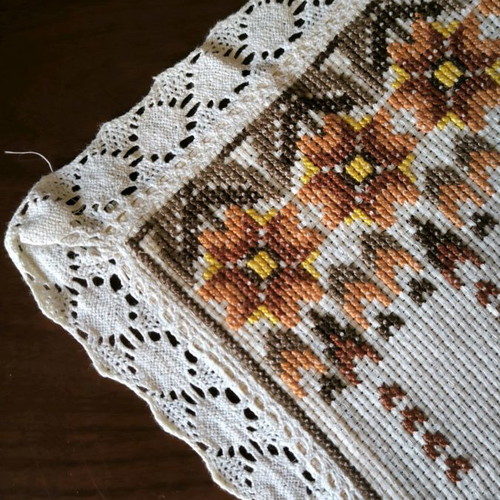 Handmade embroidered table runner with Cretan stitch and lace