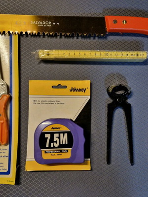Set of 6 tools new with tape measure, scissors, saw, folding ruler, pliers and cutter
