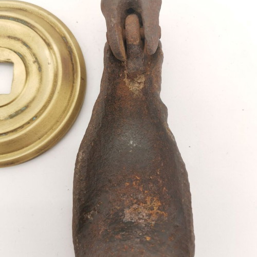 Bronze hand door knocker used from 1930 preserved door