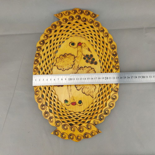 Old beautiful wooden fruit plate used