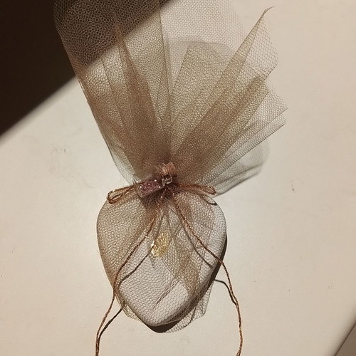 Wedding favors scented plaster heart with gold leaf and glass bottle