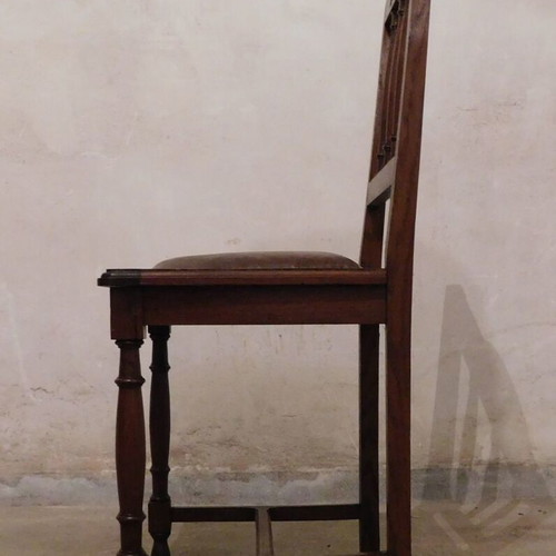 Wood-carved chairs with leather seat like new, set of 4