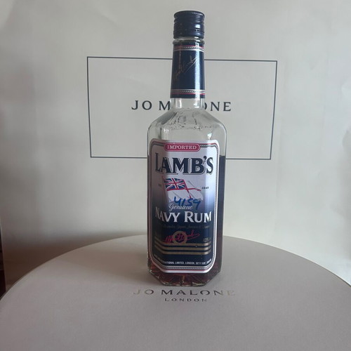 Lamb’s Navy Rum like new with hexagonal bottle