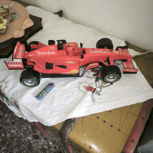 Formula 1 toy car with friction and sounds, red, like new