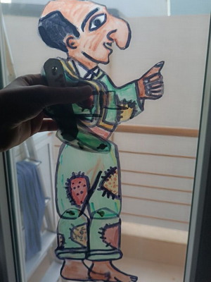Handmade shadow theatre figure Karagiozis by Nikolaos Papadopoulos