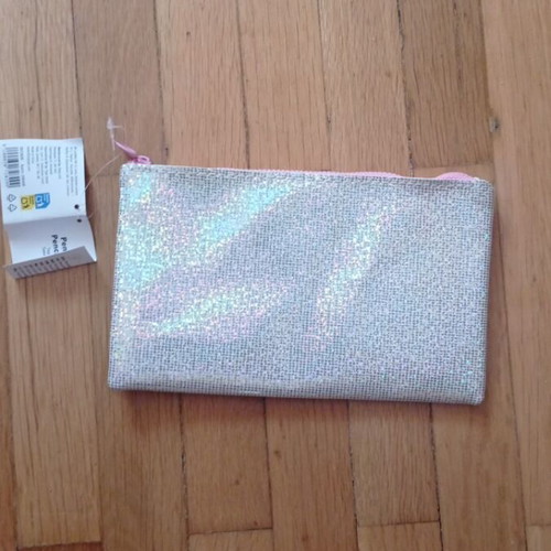 Toiletry bag with iridescent finish