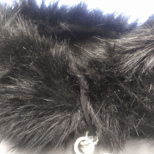 Fur neck warmer like new with metal jewelry, black and silver