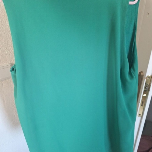 Blouse used, wide green, covers belly, one size