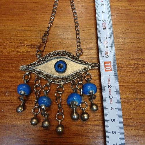 Vintage metal evil eye decoration used, silver with blue beads