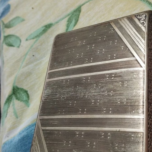 Collectible cigarette case used, carved