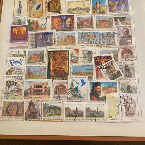 Stamp collection used with album, over 500 pieces