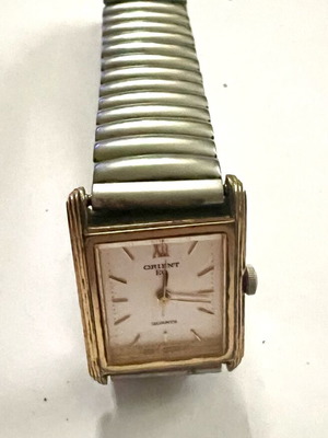 Orient women's watch used, gold and silver