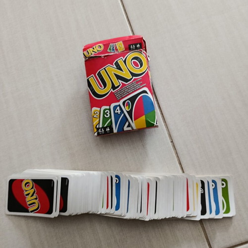 Uno card game used, classic family fun