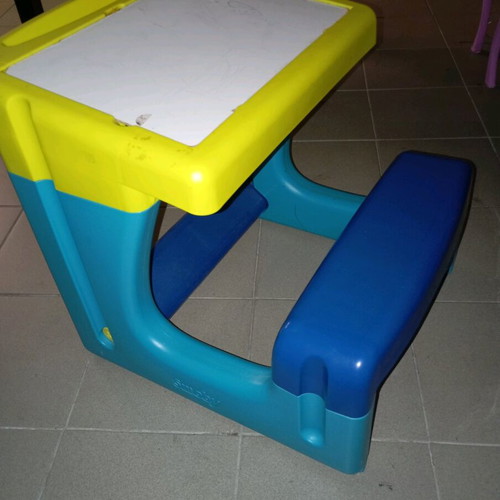 Desk used for child with board and storage space