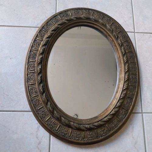 Oval mirror with carved wooden base, vintage