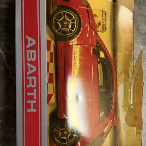 Burago Abarth collectible car like new with damaged packaging