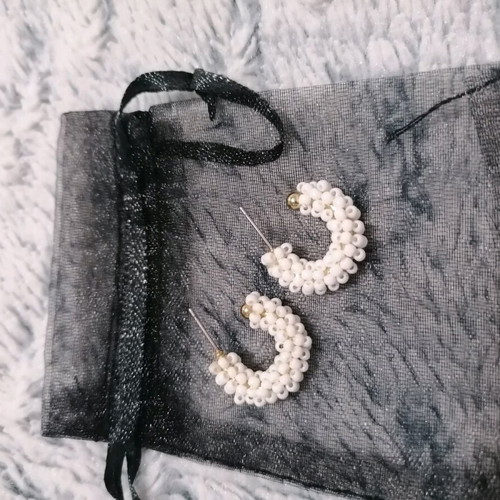 Earrings with white beads used