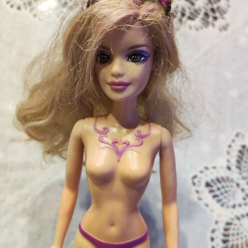 Barbie Mariposa 2008 doll used with mark on left cheek