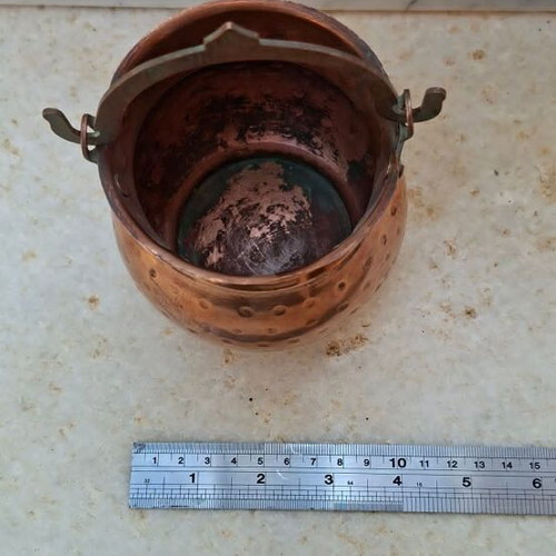Copper vessel with handle used, curved c.1950