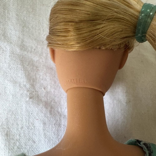 Barbie doll with blue dress