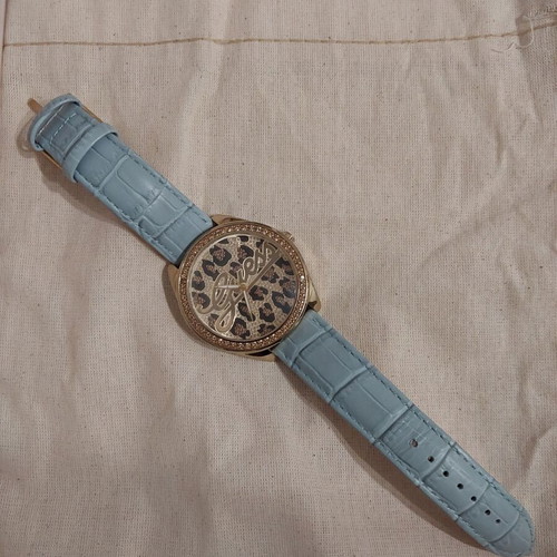 Guess 25th Anniversary Watch with Turquoise and Gold Colors