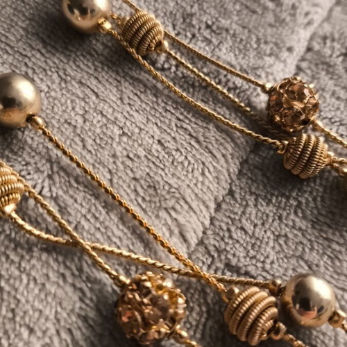 Triple necklace like new, gold tone