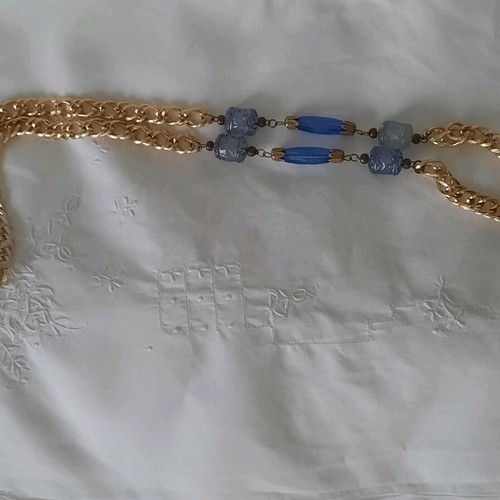 Elegant necklace with a gold-plated chain and beads.