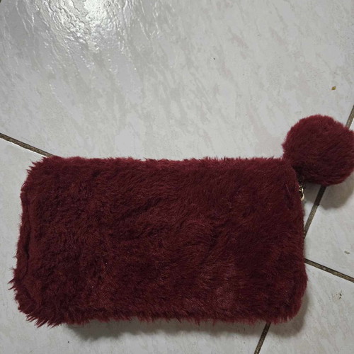 Red fluffy wallet used