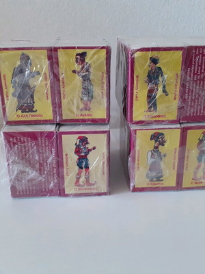 Shadow theater figure matchboxes new, four sealed packs